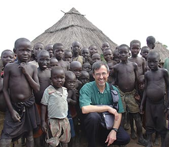 Doug Lucas with Sudanese refugees during Team Expansion