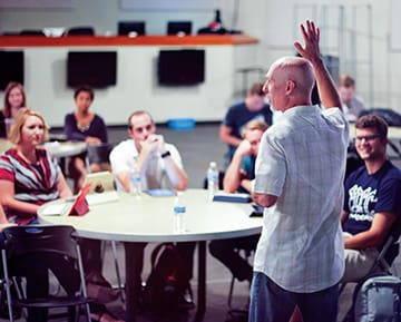 One day a week is devoted to group training. Experts in various fields of leadership share practical approaches that can be immediately implemented. This session is being led by Christ